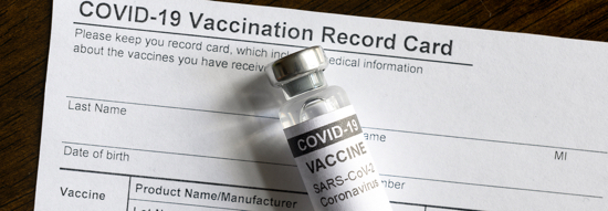 Covid-19 Vaccine Bottle On Coronavirus Vaccination Record Card, Panoramic Banner With Corona Virus V